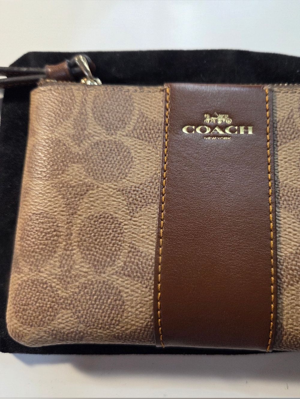 COACH Brown Signature Canvas Wristlet